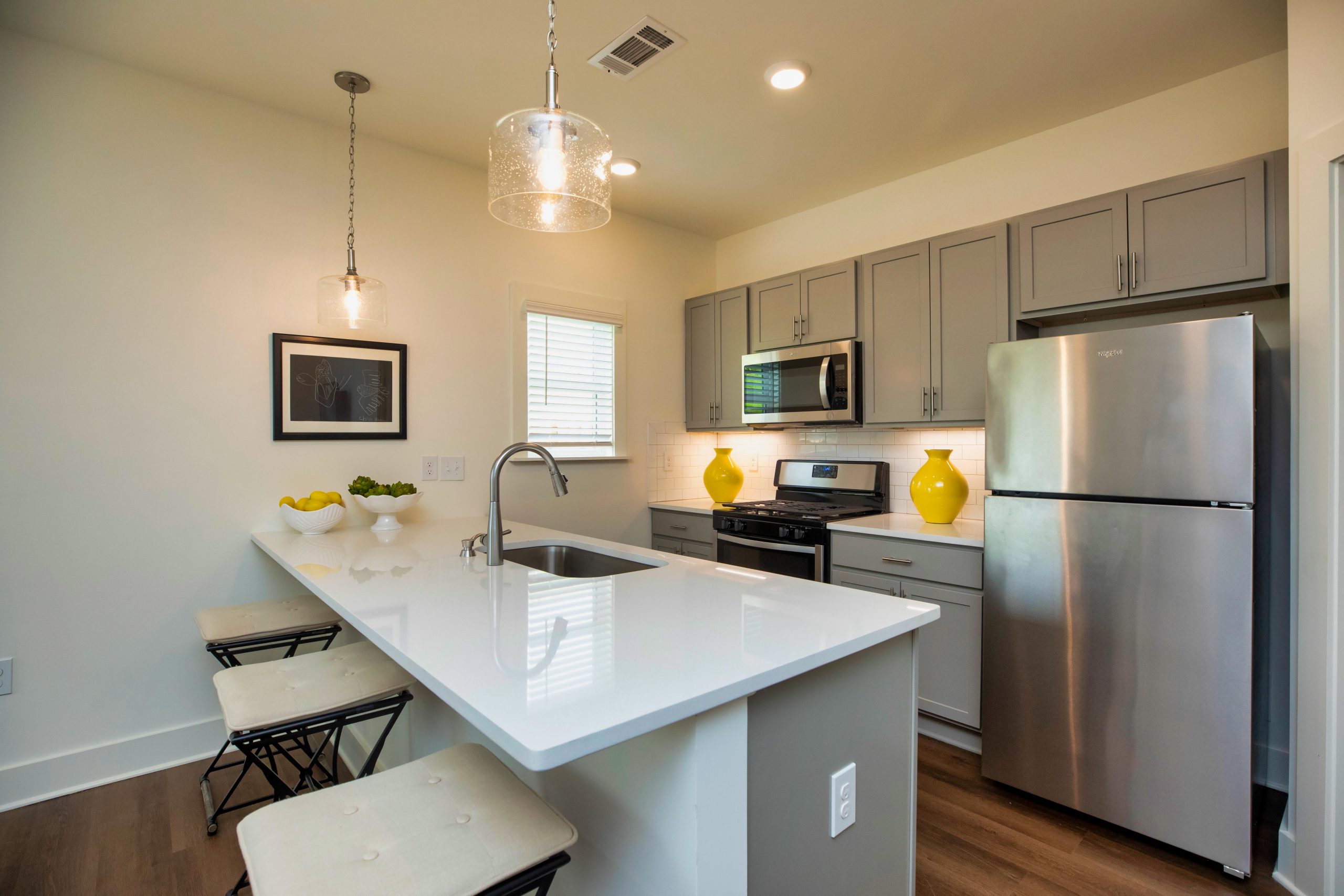 the kitchen in the new homes for rent in irondale at The Heights