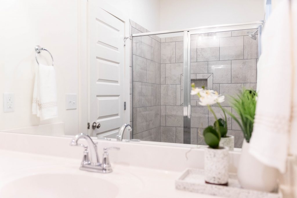 showers, bathrooms in the heights irondale new home rental community